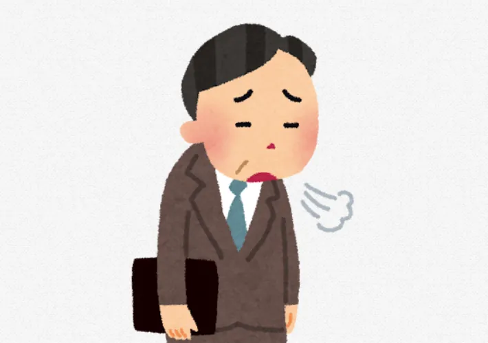 溜息をつく画像